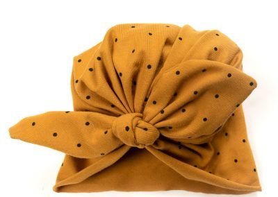Fotografía para tienda de ropa gorrito elenirc